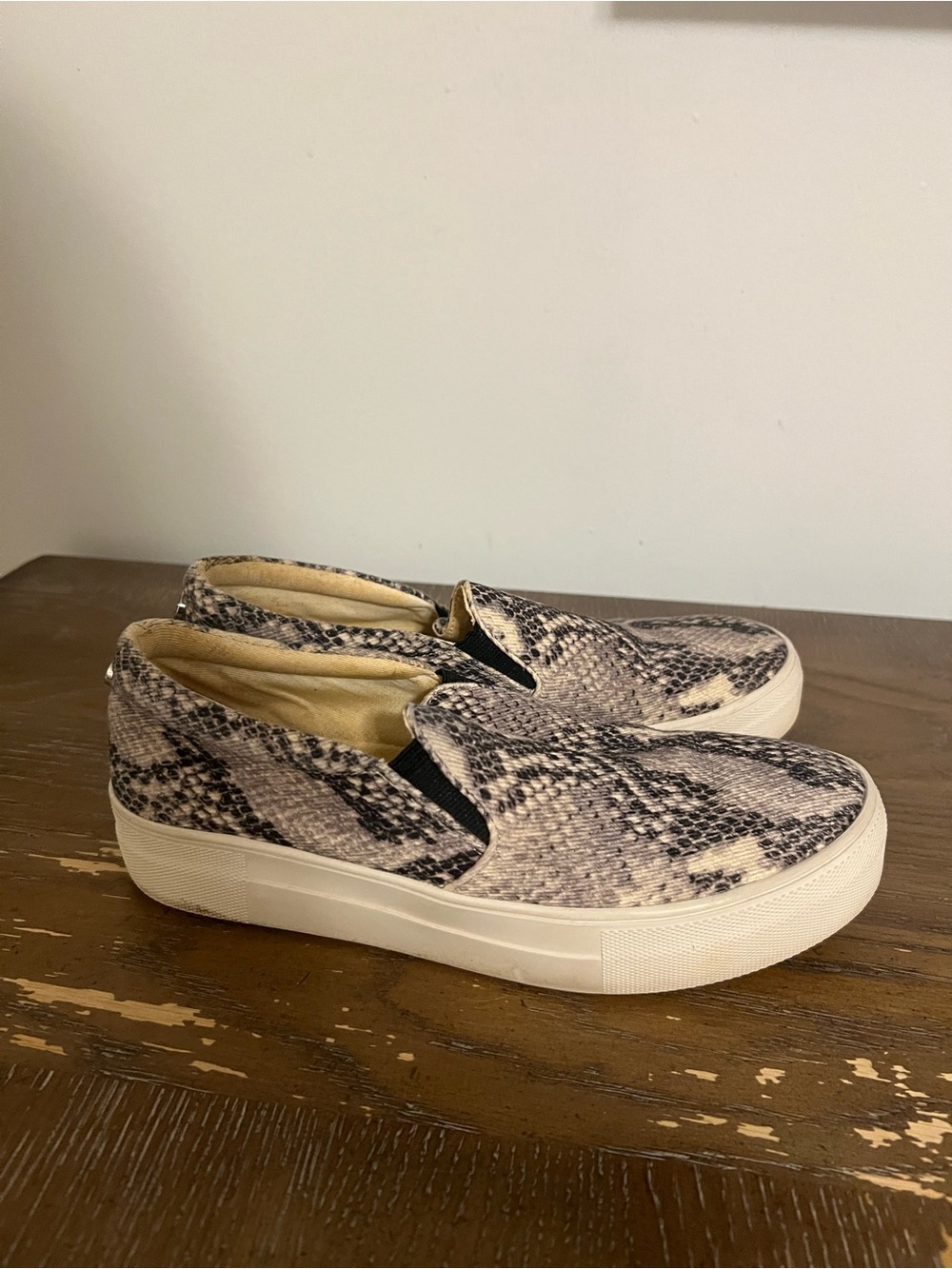Steve Madden Snake-Print Slip-On Sneakers in Beige and Black